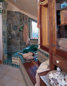 Koa, Andrea’s favorite wood, was used in the master bathroom. A soft fiberglass tub, of the kind often used in retirement homes, provides an inviting space for the bather and keeps water hot longer.